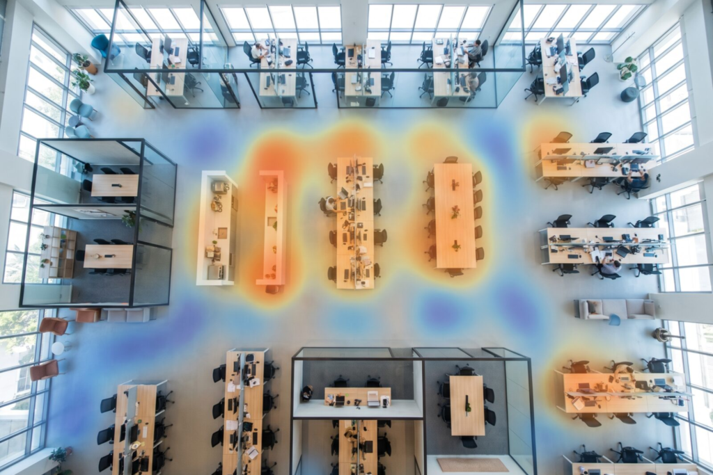 Overhead security camera view of warehouse floor used for occupancy analytics and people counting